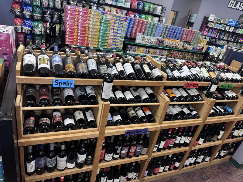 GS Vape Madison organizes part of its wine selection by country of origin, including Spain, Australia, and Argentina/Chile sections. It's a helpful setup for customers exploring wines from specific regions. International wine selection organized by country including Spain and Australia at GS Vape in Madison, Ohio